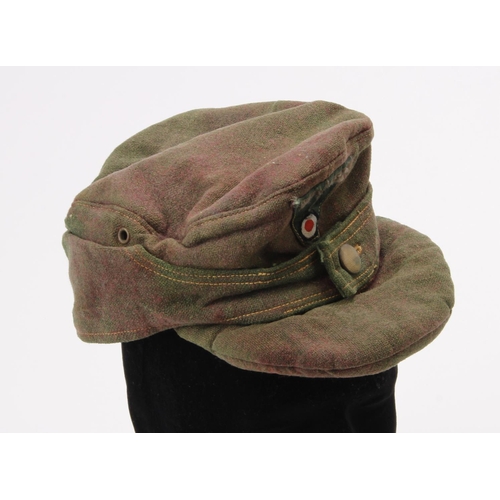 1466 - German M43 Forage cap, Whermacht with Alpine troops badge to side, faded and service worn in places