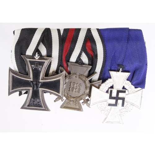 1467 - German medal group mounted as worn - Iron Cross 2nd Class, Honour Cross with Swords, 25 Years Faithf... 