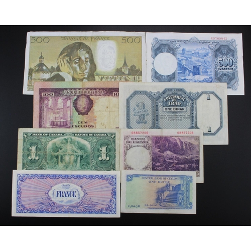 585 - World (8), a small collection comprising Iraq 1 Dinar issued 1942 (Law 1931), portrait of King Faisa... 