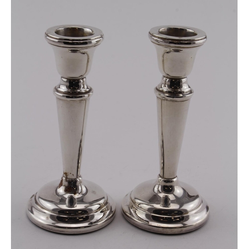 546 - Pair of silver Dwarf Candlesticks - hallmarked S&M, Birm. 1974,  Height of both 11cm approx.