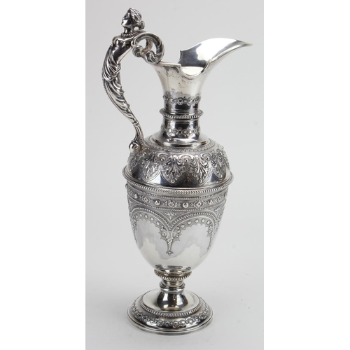 563 - Victorian silver wine ewer. Hallmarked London 1877 by Thomas Smily. Approx 32.5cm tall, weight appro... 