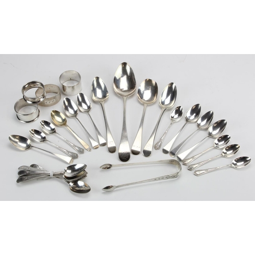 564 - Assortment of mixed flatware & napkin rings, includes George III spoons by George Gray & Peter / Ann... 