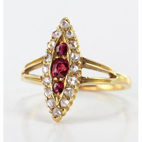 72 - Yellow metal (tests 10ct) Ring set with Rubies and old cut Diamonds size L weight 3.1g