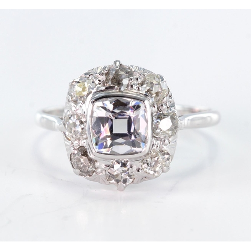 75 - White metal Ring stamped 18ct set with CZ surrounded by white Sapphires size P weight 3.2g