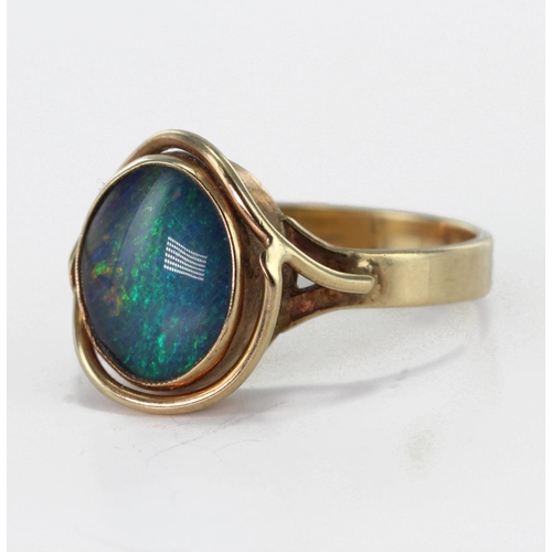 77 - 9ct stamped Ring set with Opal Triplet size O weight 4.0g