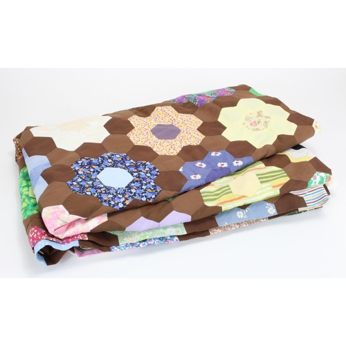 897 - Patchwork Quilt. A large multi coloured patchwork quilt (king size), size 428cm x 268cm approx.