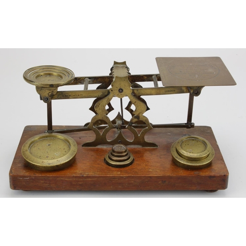 905 - Sampson Mordan & Co. brass postal scales, with a selection of weights, height 12.5cm, length 26.5cm ... 