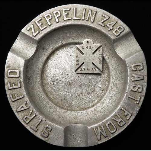 147 - Airship interest - an ashtray 'Cast from Strafed Zeppelin Z48', with an Iron Cross stamped 'Z48 ZEPP... 