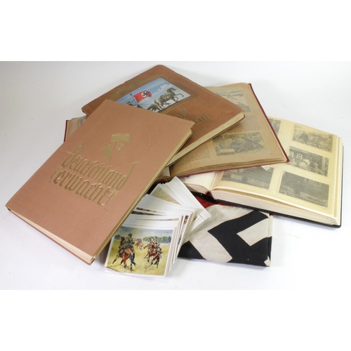 596 - German Nazi Albums x3, Photo Album x1, and one damaged Flag. (qty)