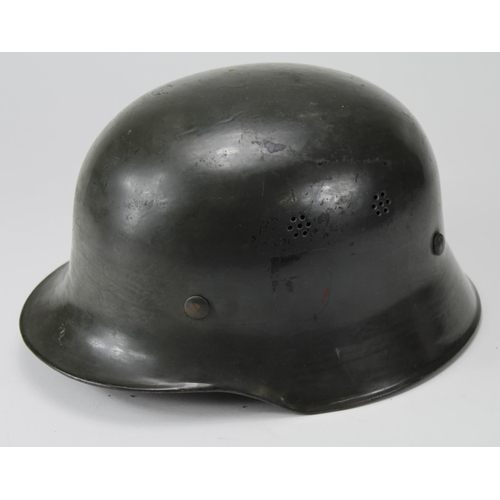 604 - German Nazi Civil Defence green helmet with liner and chin strap, remains of one decal. Maker stampe... 