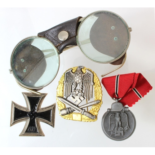 721 - German Russian Front Medal maker marked '15'. Iron Cross 1st Class no makers mark and the centre has... 