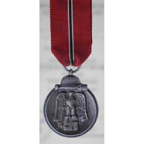 722 - German Russian Front medal with award document to Unteroffizier Richard Schwagmaier 2.gr.kw.kol.f.be... 