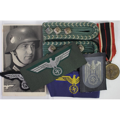 789 - German WW2 badges epaulets medals etc.