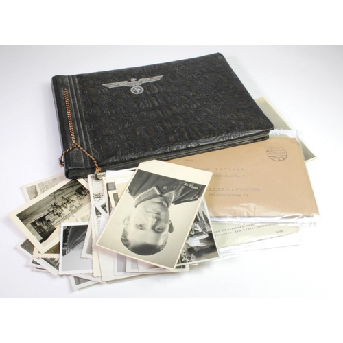 795 - German WW2 ephemera with good empty army photo album various WW2 German documents arm bands, etc.