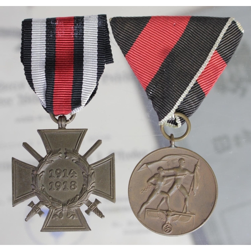 804 - German WW2 Luftwaffe 1st October 1938 medal with award document and cross of honour with award docum... 