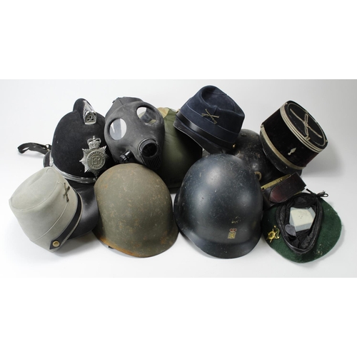 844 - Helmets / Caps - very mixed collection inc USA, French, British 'C.W.D.' WW2 helmet, etc. (Qty) Buye... 