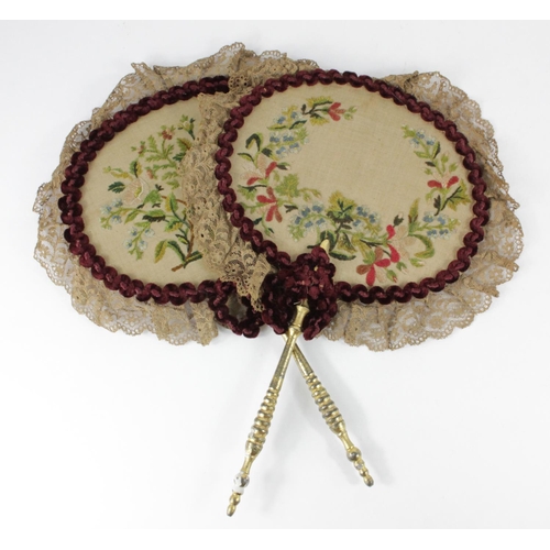 383 - Fans. Two early 20th century embroidered fans with floral decoration and lace surrounds, each with w... 