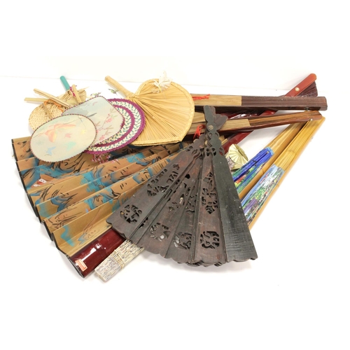 390 - Fans. Seven large decorative fans, largest length 100cm, width 130cm approx., together with six othe... 