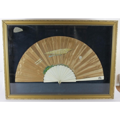 392 - Fan. A large decorative silk fan with eighteen bone sticks, depicting an early French style Lebaudy ... 