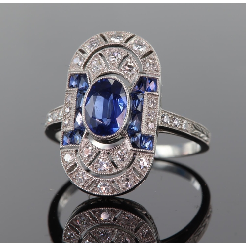 63 - Platinum sapphire and diamond Art Deco style elongated oval ring comprising central oval blue sapphi... 