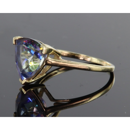 65 - 10ct yellow gold ring set with trilliant cut treated quartz, finger size O, weight 2.2g