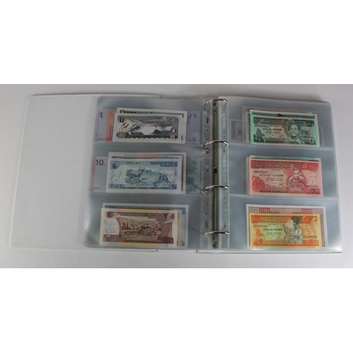 905 - World, Africa (151) a superb collection of Uncirculated notes in an album, Algeria, Angola, Biafra, ... 