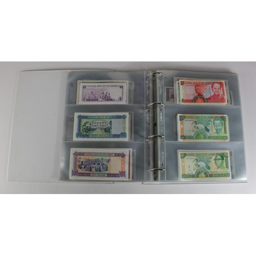 905 - World, Africa (151) a superb collection of Uncirculated notes in an album, Algeria, Angola, Biafra, ... 