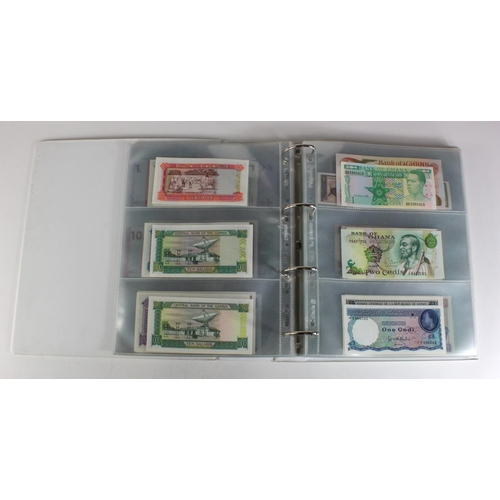 905 - World, Africa (151) a superb collection of Uncirculated notes in an album, Algeria, Angola, Biafra, ... 