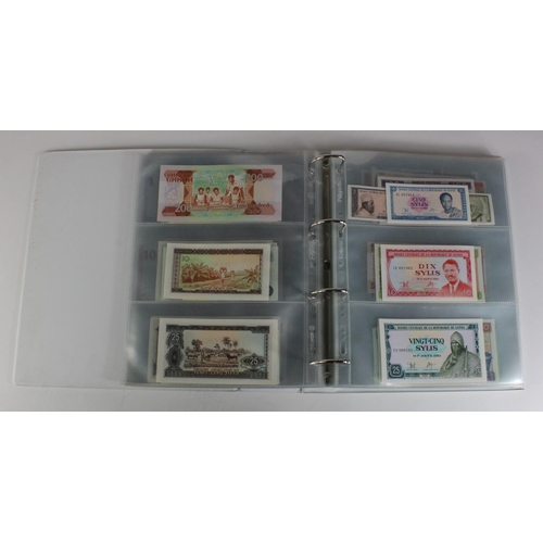 905 - World, Africa (151) a superb collection of Uncirculated notes in an album, Algeria, Angola, Biafra, ... 