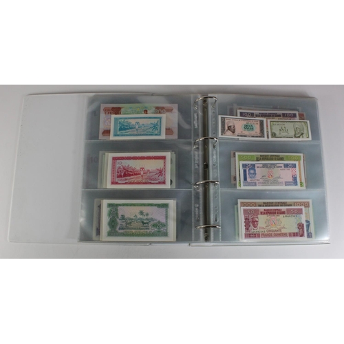 905 - World, Africa (151) a superb collection of Uncirculated notes in an album, Algeria, Angola, Biafra, ... 