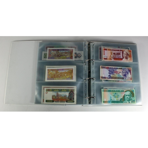 905 - World, Africa (151) a superb collection of Uncirculated notes in an album, Algeria, Angola, Biafra, ... 