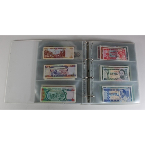 905 - World, Africa (151) a superb collection of Uncirculated notes in an album, Algeria, Angola, Biafra, ... 