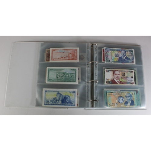 905 - World, Africa (151) a superb collection of Uncirculated notes in an album, Algeria, Angola, Biafra, ... 