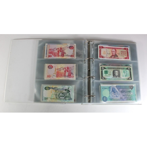 905 - World, Africa (151) a superb collection of Uncirculated notes in an album, Algeria, Angola, Biafra, ... 