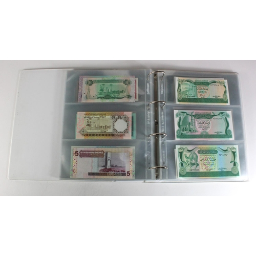 905 - World, Africa (151) a superb collection of Uncirculated notes in an album, Algeria, Angola, Biafra, ... 