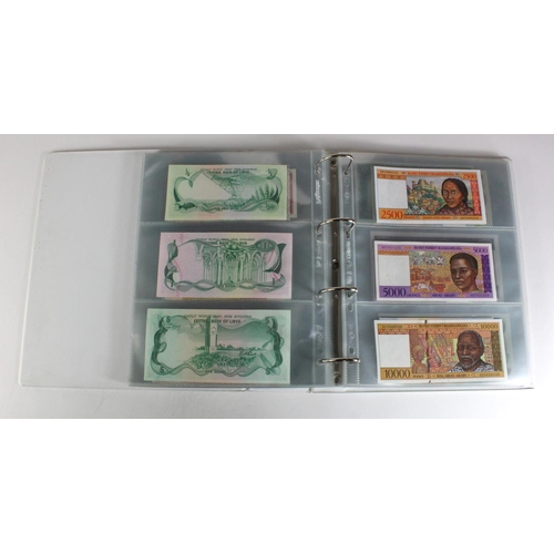 905 - World, Africa (151) a superb collection of Uncirculated notes in an album, Algeria, Angola, Biafra, ... 