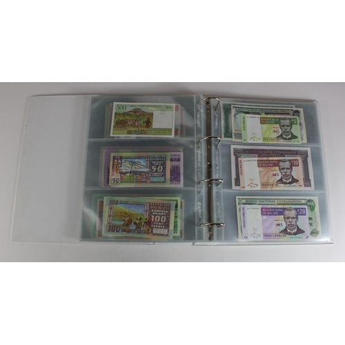 905 - World, Africa (151) a superb collection of Uncirculated notes in an album, Algeria, Angola, Biafra, ... 