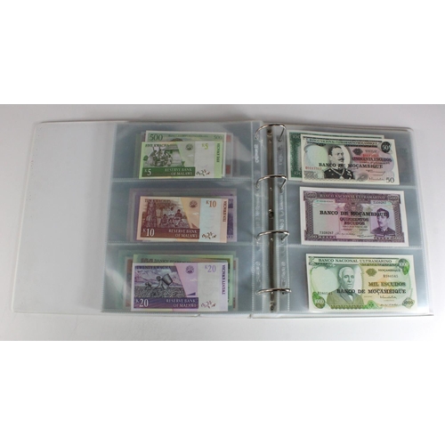 905 - World, Africa (151) a superb collection of Uncirculated notes in an album, Algeria, Angola, Biafra, ... 