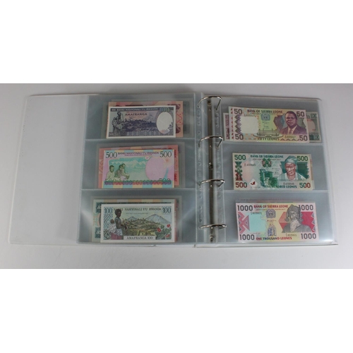 905 - World, Africa (151) a superb collection of Uncirculated notes in an album, Algeria, Angola, Biafra, ... 