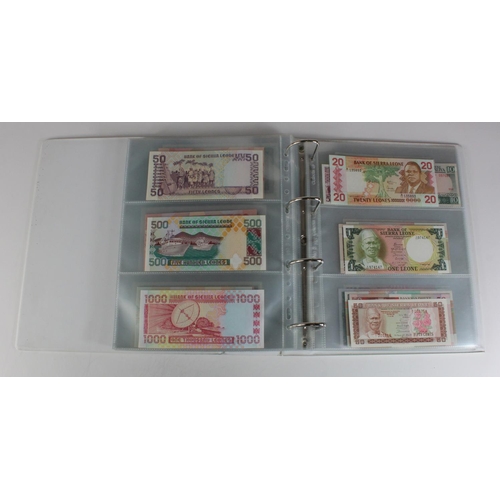 905 - World, Africa (151) a superb collection of Uncirculated notes in an album, Algeria, Angola, Biafra, ... 