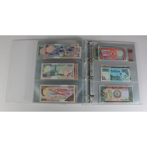 905 - World, Africa (151) a superb collection of Uncirculated notes in an album, Algeria, Angola, Biafra, ... 