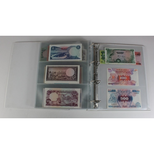 905 - World, Africa (151) a superb collection of Uncirculated notes in an album, Algeria, Angola, Biafra, ... 