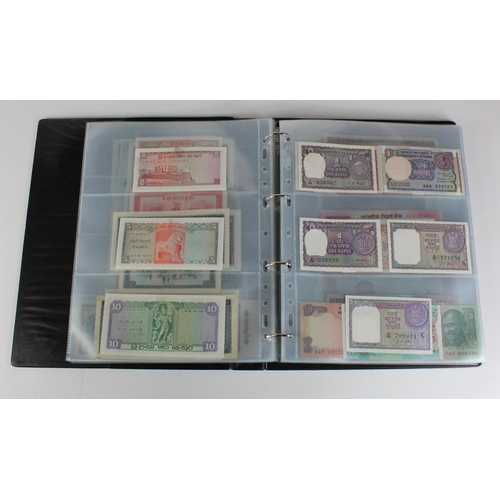 907 - World, Asia (171) collection in an album, the majority Uncirculated, Afghanistan, Azerbaijan, Bangla... 