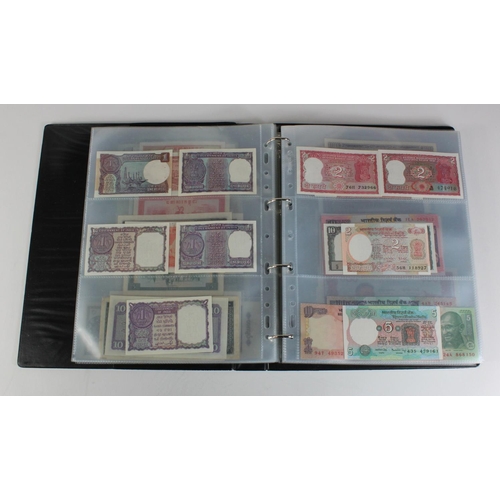 907 - World, Asia (171) collection in an album, the majority Uncirculated, Afghanistan, Azerbaijan, Bangla... 