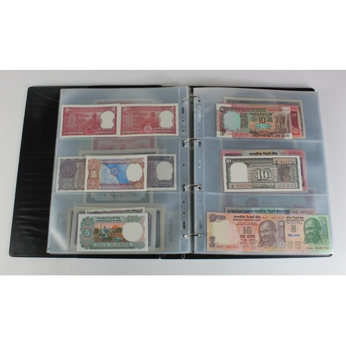 907 - World, Asia (171) collection in an album, the majority Uncirculated, Afghanistan, Azerbaijan, Bangla... 