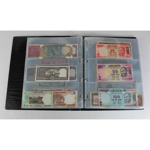 907 - World, Asia (171) collection in an album, the majority Uncirculated, Afghanistan, Azerbaijan, Bangla... 