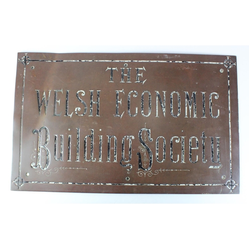 92 - Welsh Economic Building Society wall sign/plaque, heavy metal sign probably brass with lettering and... 