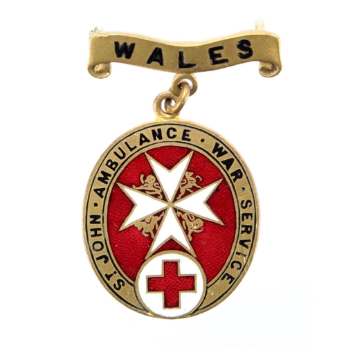 1024 - St. John Ambulance War Service badge with a Wales bar No. 560  