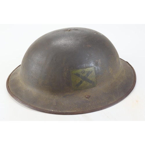 1075 - WW1 British Brodie Helmet with unit markings of the Machine Gun Corps. No liner. Maker Hadfield & So... 