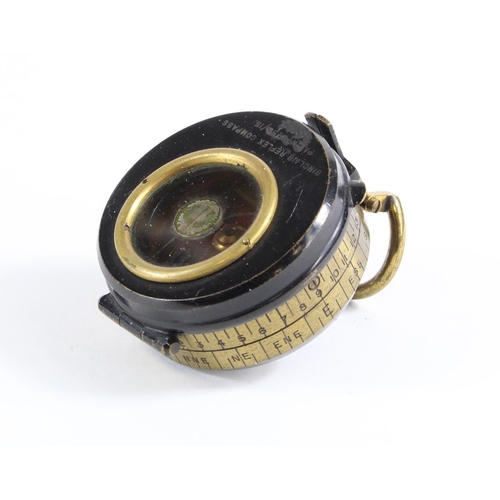 1104 - WW1 pattern fluid filed pocket compass.